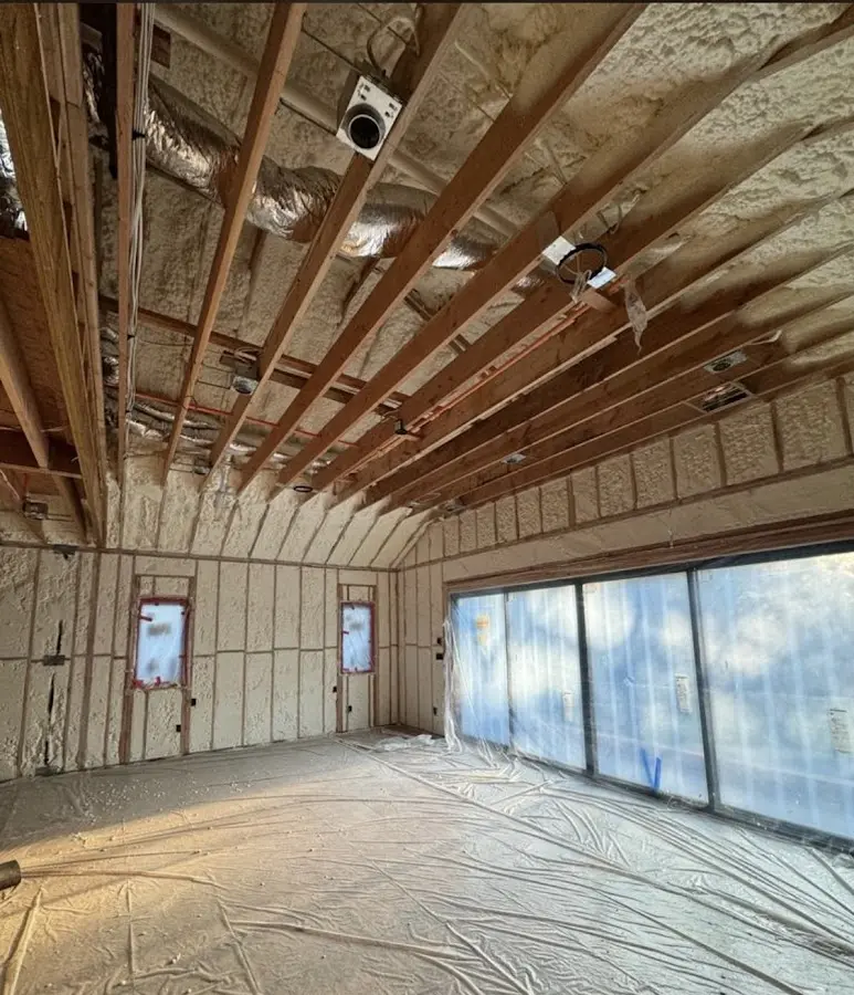 Interior walls and ceiling insulated with spray foam during new construction in Cascades